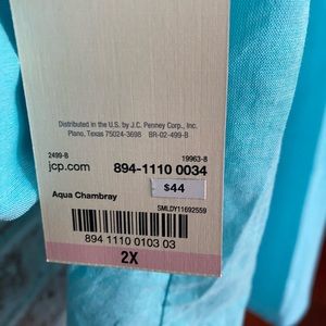 Women’s button up chambray shirt.